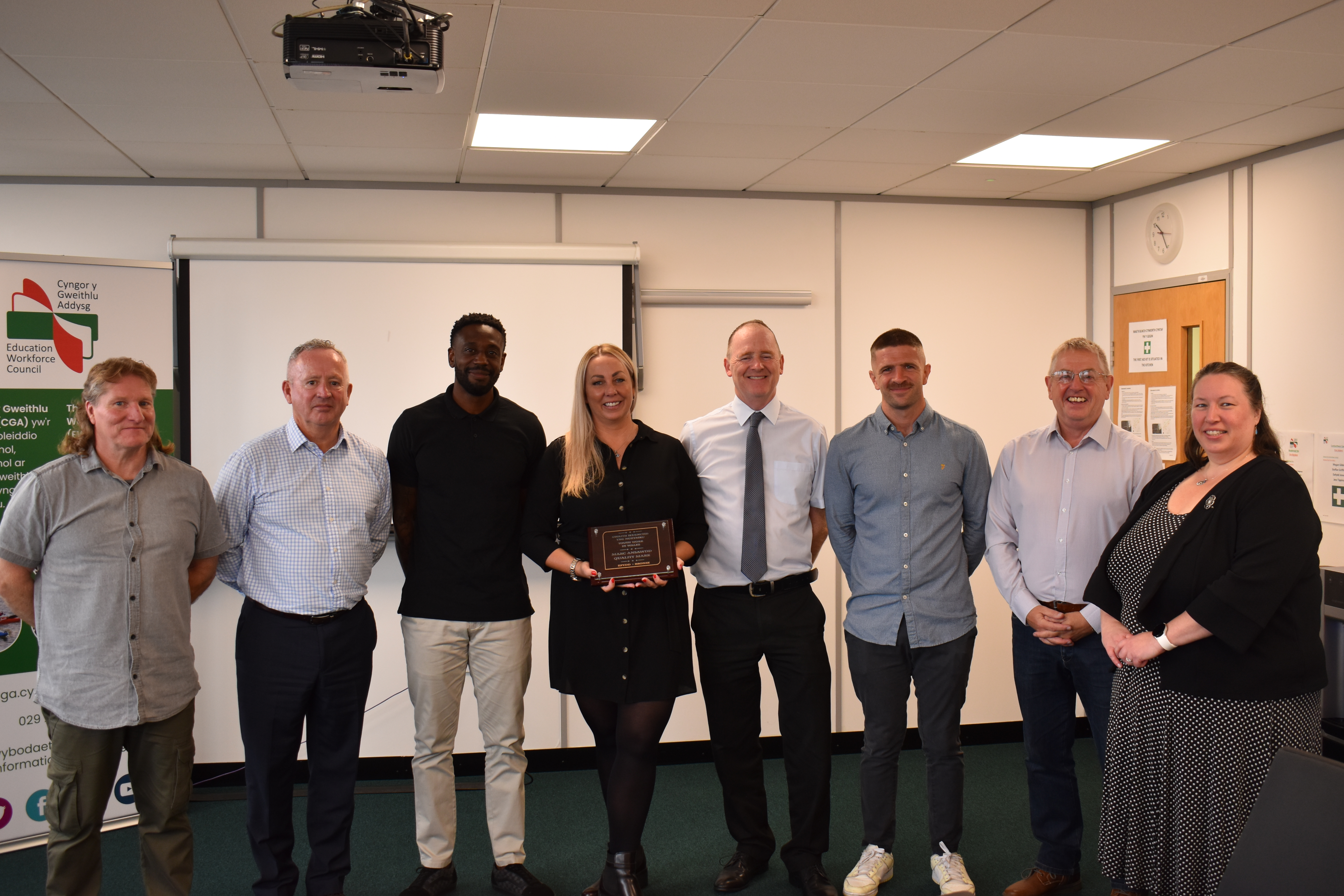 2.	Dewi Thomas (QMYW assessor), Ian Price, Jake Henry and Karen Henry (Vibe Youth), Hayden Llewellyn (EWC), Lewis Jones (Vibe Youth), Andy Borsden (EWC), Donna Robins (Welsh Government)